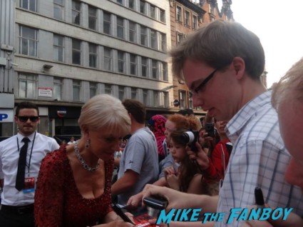 Helen Mirren signing autographs at the red 2 european movie premiere red carpet mary louise parker helen mirren (20)