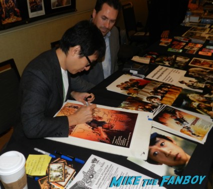Jonathan Ke Huy Quan signing autographs for fans at hollywood show julie newmar signing autographs catwoman barbie 009