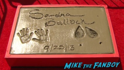 sandra bullock handprint ceremony signing autographs gravity (1)