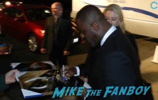 Idris Elba signing autographs at the Palm Springs International Film Festival 2014 signing autographs bono sandra bullock16
