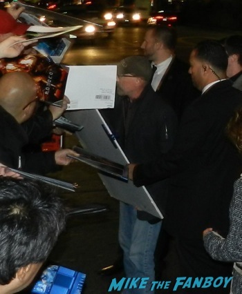 Jackie Earle Haley signing autographs Robocop movie premiere los angeles red carpet 12