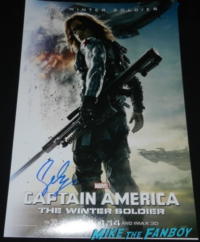 Sebastian Stan signing autographs Captain America: The Winter Soldier premiere red carpet25 Captain America: The Winter Soldier premiere red carpet43