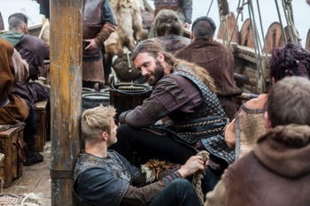 Bjorn (Alexander Ludwig) and Rollo (Clive Standen) bond on the boat