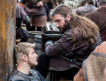 Bjorn (Alexander Ludwig) and Rollo (Clive Standen) bond on the boat