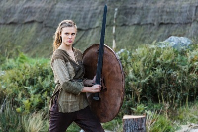 Porunn (Gaia Weiss) looking a bit like a young Lagertha with those blonde braids, beautiful looks, bearing a shield & sword!