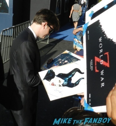 sam riley signing autographs Maleficent los angeles premiere photos brad pitt signing autographs  angelina jolie   19