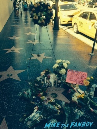 Joan Rivers walk of fame star fans remember flowers  1