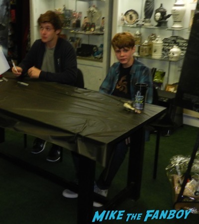 Ty Simpkins And Nick Robinson jurassic world poster signing autograph 3