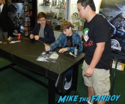 Ty Simpkins And Nick Robinson jurassic world poster signing autograph 3