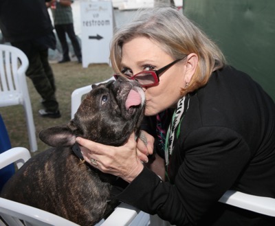 SAN DIEGO, CA - JULY 10: Actress Carrie Fisher and more than 6000 fans enjoyed a surprise `Star Wars` Fan Concert performed by the San Diego Symphony, featuring the classic `Star Wars` music of composer John Williams, at the Embarcadero Marina Park South on July 10, 2015 in San Diego, California.  (Photo by Jesse Grant/Getty Images for Disney) *** Local Caption *** Carrie Fisher