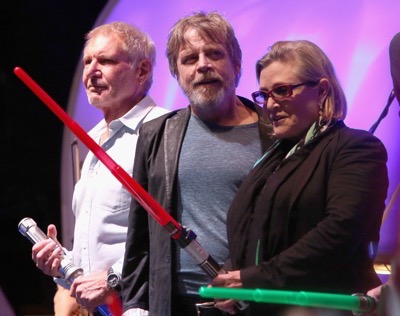 SAN DIEGO, CA - JULY 10:  (L-R) Actors Harrison Ford, Mark Hamill, Carrie Fisher and more than 6000 fans enjoyed a surprise `Star Wars` Fan Concert performed by the San Diego Symphony,  featuring the classic `Star Wars` music of composer John Williams, at the Embarcadero Marina Park South on July 10, 2015 in San Diego, California.  (Photo by Jesse Grant/Getty Images for Disney) *** Local Caption *** Harrison Ford; Mark Hamill; Carrie Fisher