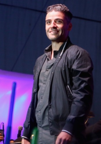 SAN DIEGO, CA - JULY 10: Actors Oscar Isaac and more than 6000 fans enjoyed a surprise `Star Wars` Fan Concert performed by the San Diego Symphony,  featuring the classic `Star Wars` music of composer John Williams, at the Embarcadero Marina Park South on July 10, 2015 in San Diego, California.  (Photo by Jesse Grant/Getty Images for Disney) *** Local Caption *** Oscar Isaac