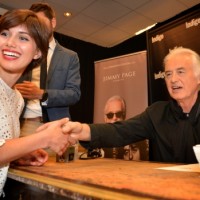 jimmy page stamping autographs