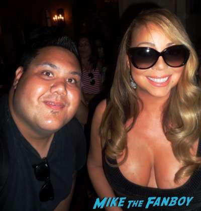 Mariah Carey walk of fame star ceremony signing autographs fan photo 