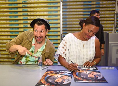 Lucky Yates (left), Aisha Tyler during The 'Archer' booth signing at Comic-Con International 2015 in San Diego, California.  Cr: Alan Hess/PictureGroup/FX