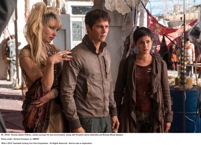 MAZE RUNNER: THE SCORCH TRIALS Thomas (Dylan O’Brien, center) surveys his new environment, along with Ponytail (Jenny Gabrielle) and Brenda (Rosa Salazar). Photo credit: Richard Foreman, Jr. SMPSP TM and © 2015 Twentieth Century Fox Film Corporation.  All Rights Reserved.  Not for sale or duplication.