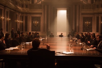 Oberhauser (Christoph Waltz) chairs a meeting in Metro-Goldwyn-Mayer Pictures/Columbia Pictures/EON Productions' action adventure SPECTRE.