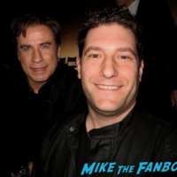 John Travolta fan photo selfie signing autographs