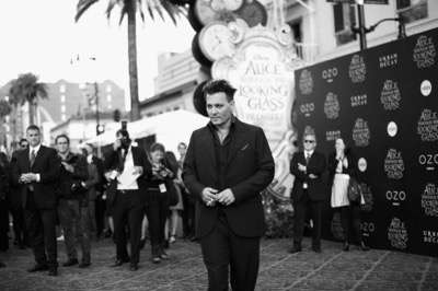 HOLLYWOOD, CA - MAY 23:  (EDITORS NOTE: Image has been shot in black and white. Color version not available.) Actor Johnny Depp attends Disneyís 'Alice Through the Looking Glass' premiere with the cast of the film, which included Johnny Depp, Anne Hathaway, Mia Wasikowska and Sacha Baron Cohen at the El Capitan Theatre on May 23, 2016 in Hollywood, California.  (Photo by Charley Gallay/Getty Images for Disney) *** Local Caption *** Johnny Depp