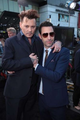 Johnny Depp and Sacha Baron Cohen pose together at The US Premiere of Disney's "Alice Through the Looking Glass" at the El Capitan Theater in Los Angeles, CA on Monday, May 23, 2016.