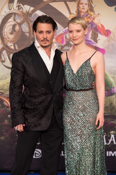LONDON UK : Johnny Depp and Mia Wasikowska, the stars  of Disney's "Alice Through The Looking Glass," attend the European Premiere in London on 10th May 2016.  ( Credit : James Gillham / StingMedia )