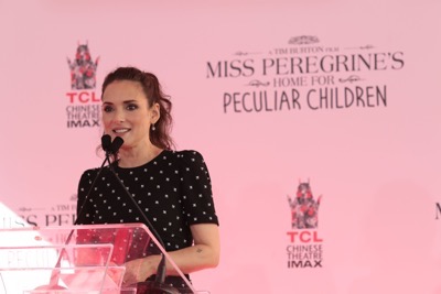 Winona Ryder speaks at Tim Burton's Hand & Footprint Ceremony presented by 20th Century Fox celebrating the release of his newest film "Miss Peregrine's Home for Peculiar Children" at the TCL Chinese Theatre in Los Angeles, CA on September 8, 2016. (Photo: Alex J. Berliner/ABImages)