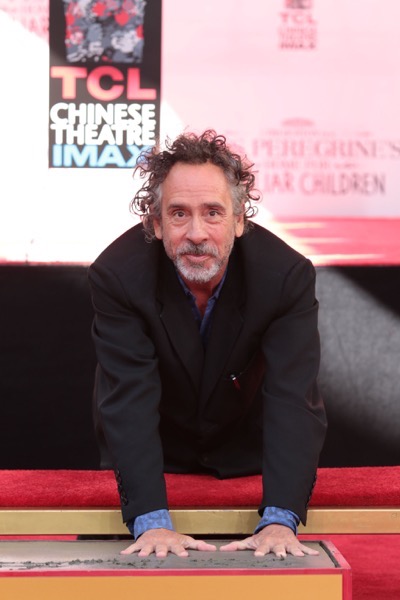 Tim Burton celebrates at his Hand & Footprint Ceremony presented by 20th Century Fox in celebration of his newest film "Miss Peregrine's Home for Peculiar Children" at the TCL Chinese Theatre in Los Angeles, CA on September 8, 2016. (Photo: Alex J. Berliner/ABImages)
