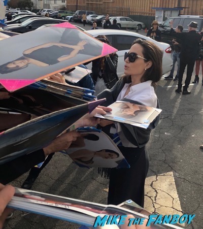 Angelina Jolie meeting fans signing autographs golden globe panel 2018 2