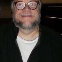 Guillermo del Toro with fans signing autographs 1