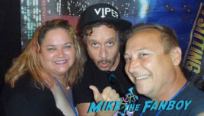 Pauley Shore with fans signing autographs